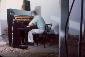 Performance by Tony Conrad at Hallwalls, 1979.